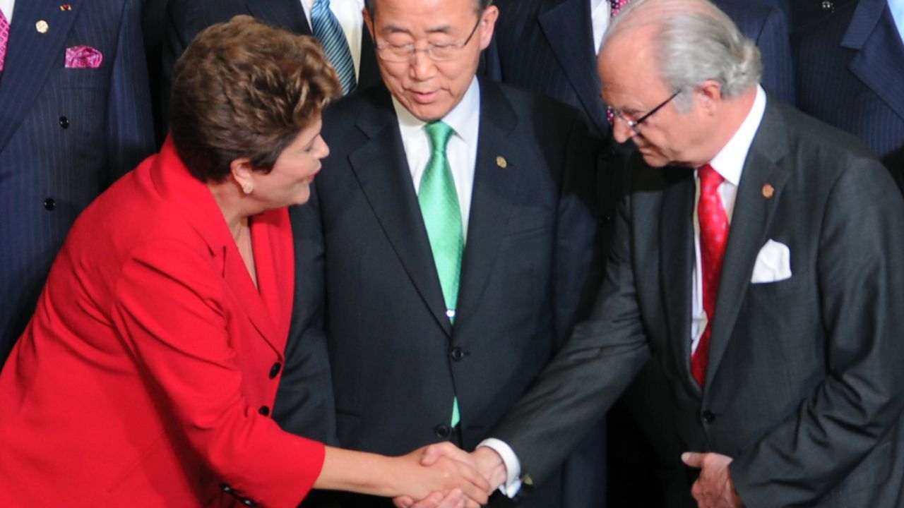Brazil's President Dilma Rousseff, left, greets Sweden's King Carl Gustaf as U.N. Secretary-General Ban Ki-moon looks on.