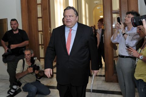 Pasok party leader Evangelos Venizelos arrives for a meeting with New Democracy leader, Antonis Samaras at the Greek Parliament in Athens on June 20, 2012. Greece's three main pro-euro parties reached a deal to form a new Greek government on Wednesday.
