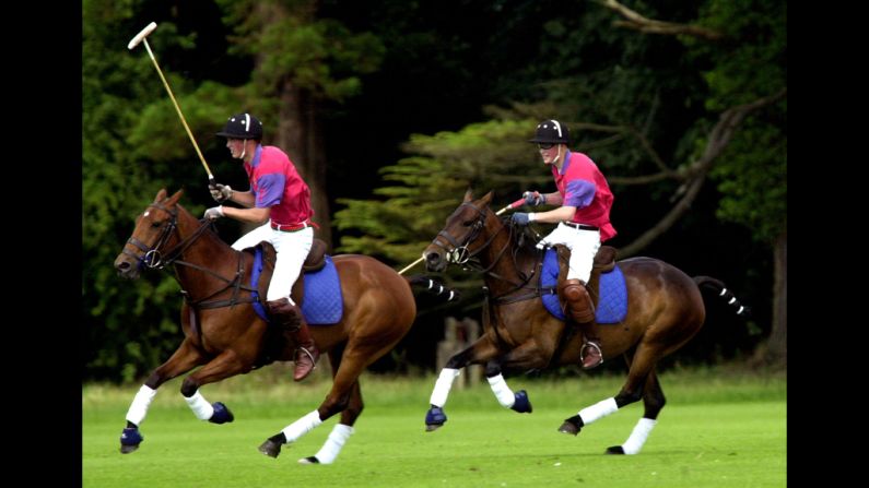In 2001, Prince William, left, and Prince Harry take part in an exhibition polo match in Gloucestershire, England.
