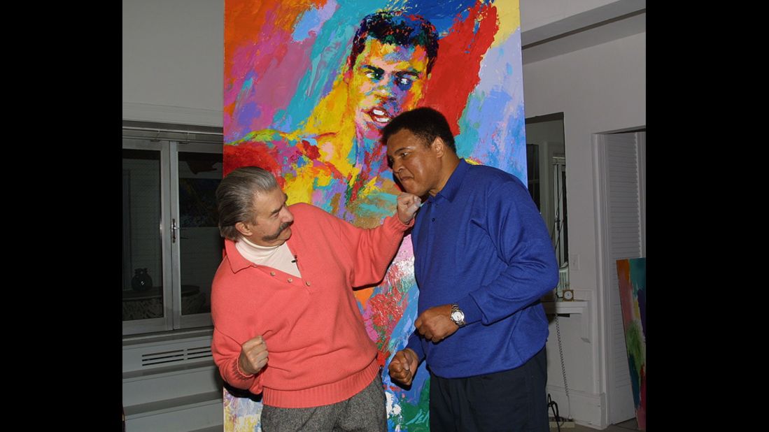 Muhammad Ali and  Neiman clown around during Ali's visit to Neiman's New York studio to see his newest serigraph "Muhammad Ali-Athlete of the Century" in 2001.