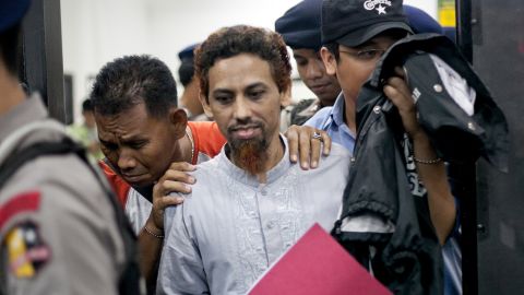 Umar Patek leaves the courtroom in Jakarta, Indonesia, during his trial on June 4, 2012. 