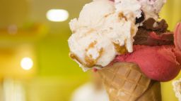 ice cream cone with assorted scoops of ice cream