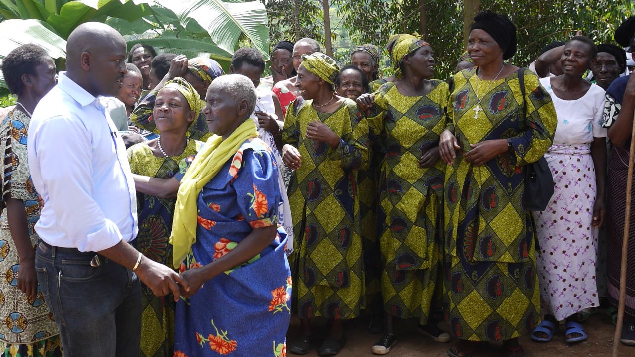 Grandmothers in Jackson Kaguri's former village urged him to do more to help. He didn't want to let them down.