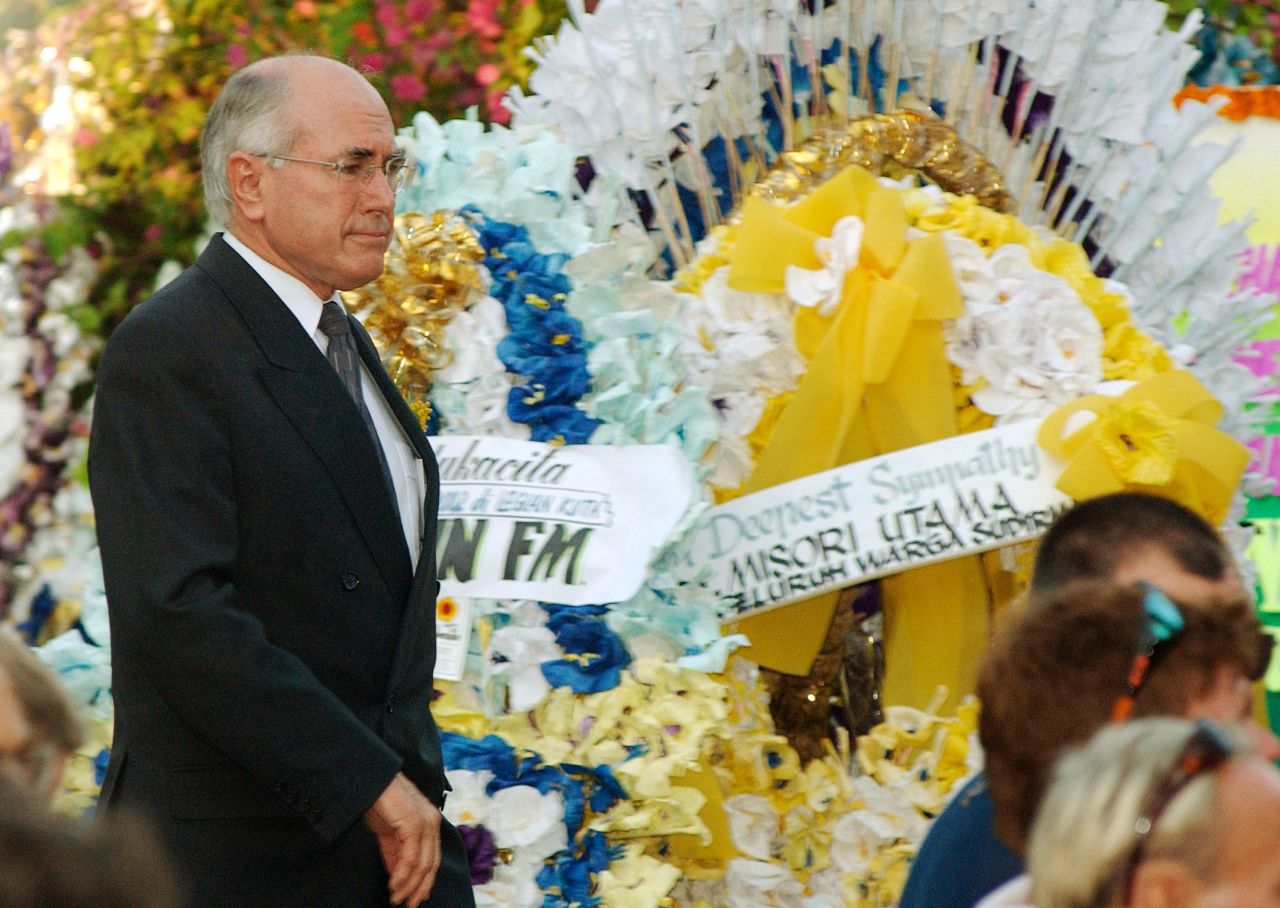Australian Prime Minister John Howard arrives for a memorial service for the bombing victims in Denpasar, Bali, on October 17, 2002. A day of national mourning was declared in the wake of the blasts.