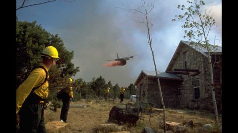 Greer's second-place image is from the "wildland/urban interface" category of firefighters watching a retardant drop on the Burn Canyon Fire in Colorado.