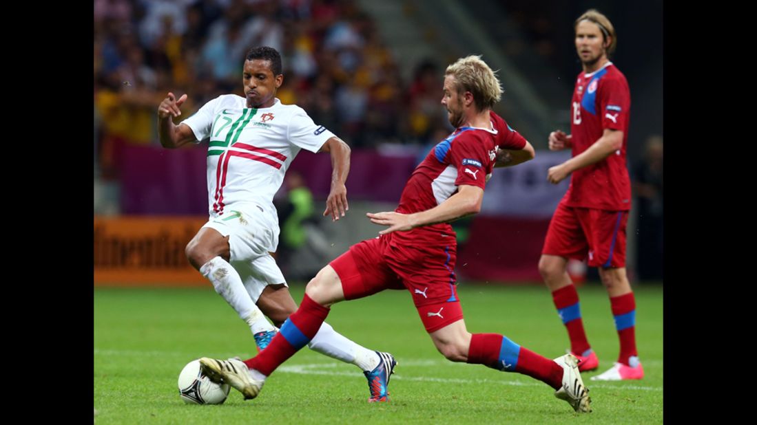 Tom Hubschman of Czech Republic defends against Portugal's Nani during the quarter final between Czech Republic and Portugal at The National Stadium on June 21, 2012 in Warsaw.