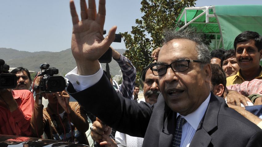 Makhdoom Shahabuddin, the nominated candidate for prime minister by Pakistani President Asif Ali Zardari, waves as he leaves the Parliament House after submitting his nomination papers in Islamabad on June 21, 2012. Shahabuddin lodged his bid to be elected prime minister by parliament, in a move expected to end a power vacuum created by the dismissal of premier Yousaf Raza Gilani for contempt on June 19, 2012. AFP PHOTO / Aamir QURESHI (Photo credit should read AAMIR QURESHI/AFP/GettyImages)  