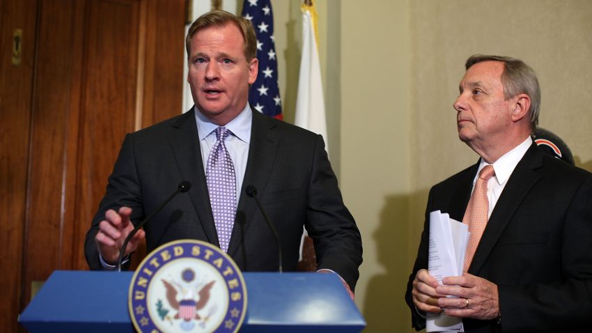 WASHINGTON, DC - JUNE 20: U.S. Senate Majority Whip Sen. Richard Durbin (D-IL) (R) and NFL Commissioner Roger Goodell (L) participate in a news briefing after their meeting June 20, 2012 on Capitol Hill in Washington, DC. Goodell was on the Hill to discuss bounties in professional sports. (Photo by Alex Wong/Getty Images)