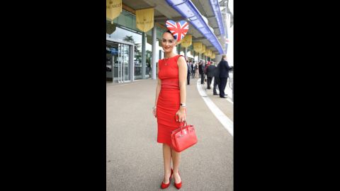 A race-goer poses on day three of the Royal Ascot.