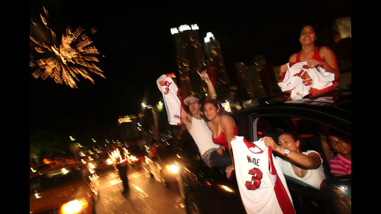 Fans celebrate the Miami Heat's victory over the Oklahoma City Thunder in the 2012 NBA Finals.