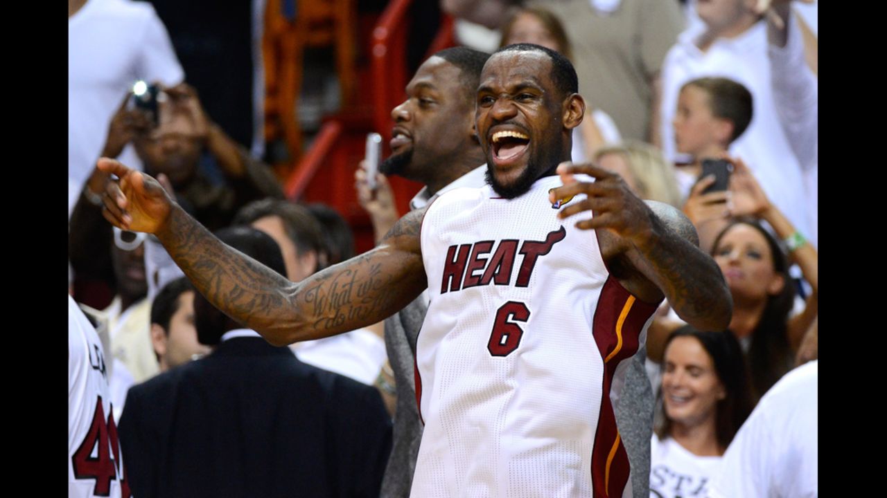 LeBron James No. 6 of the Heat celebrates late in the fourth quarter against the Thunder.