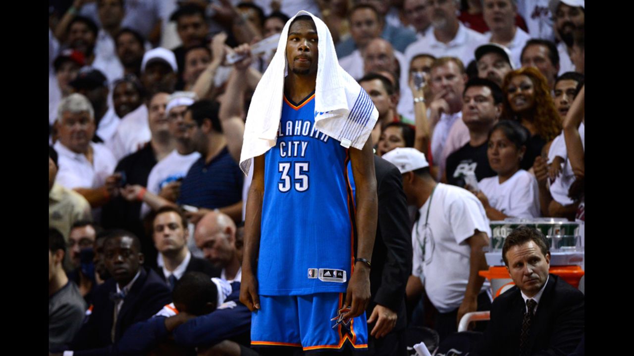 Kevin Durant No. 35 of the Thunder looks on dejected late in the fourth quarter against the Heat.