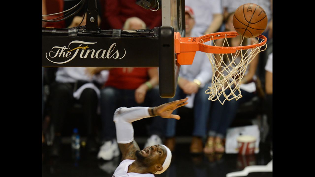 LeBron James of the Heat scores against the Thunder.