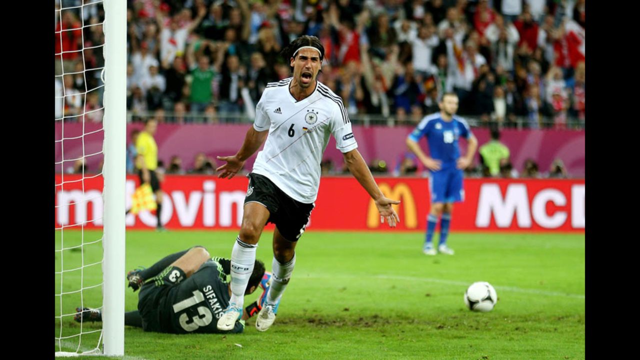 Sami Khedira celebrates scoring a goal that put Germany ahead 2-1 against Greece on Friday, June 22, during a quarterfinal match in Gdansk, Poland.