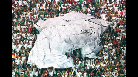  A giant German football shirt is seen in the crowd during the quarterfinal match between Germany and Greece at The Municipal Stadium on Friday, June 22, in Gdansk, Poland. 
