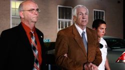  Former Penn State assistant football coach Jerry Sandusky leaves the Centre County Courthouse in handcuffs after a jury found him guilty in his sex abuse trial on June 22, 2012 in Bellefonte, Pennsylvania.