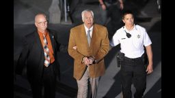 A view from above as Sandusky is led fromt he courthouse in handcuffs.