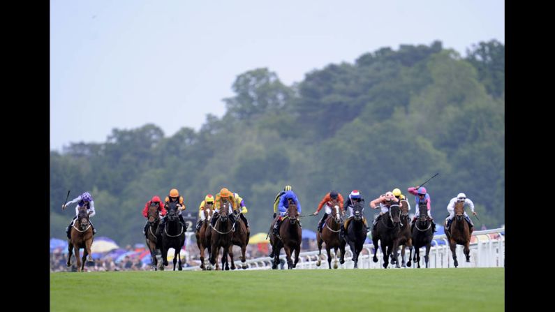 Riders race during the Diamond Jubilee Stakes on day five of Royal Ascot races Saturday. 
