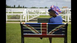A race-goer attends day five of the Royal Ascot races in Ascot, England, on Saturday, June 23. 