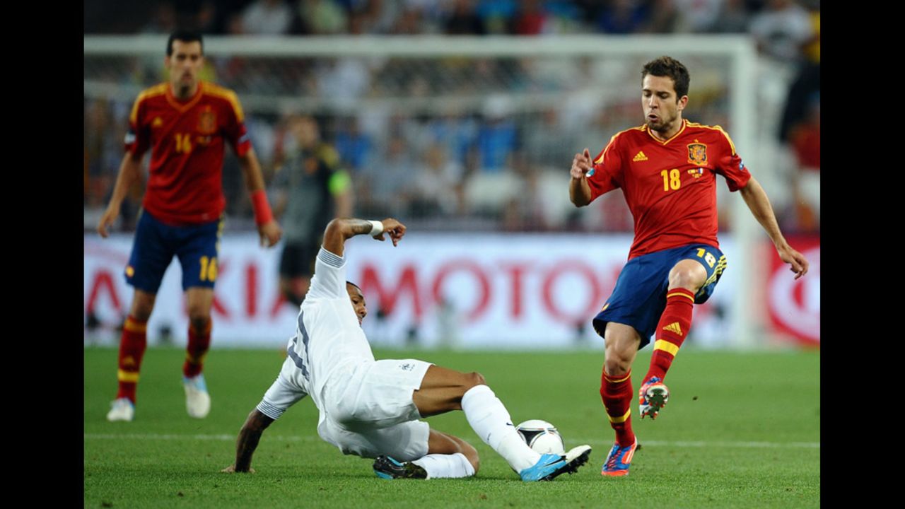 Jordi Alba of Spain challenges Yann M'Vila of France during a Euro 2012 quarterfinal match Saturday.