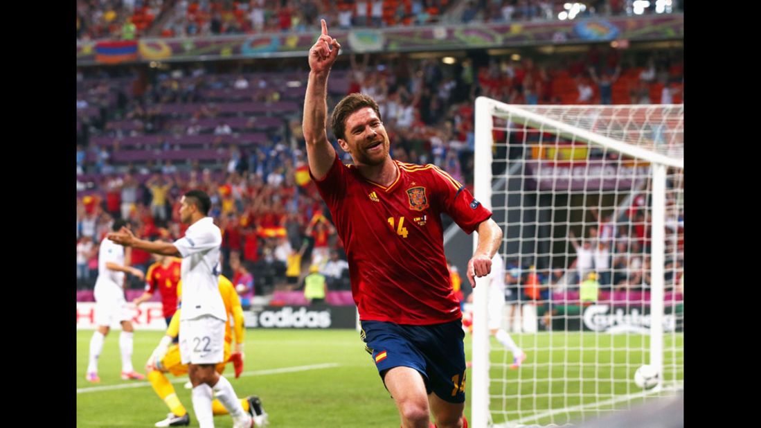 Xabi Alonso of Spain celebrates after scoring the first goal during the quarterfinal match between Spain and France.