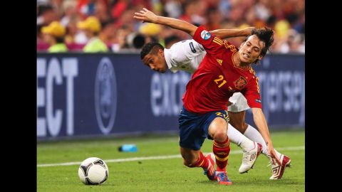 Gael Clichy of France and David Silva of Spain contend for the ball.