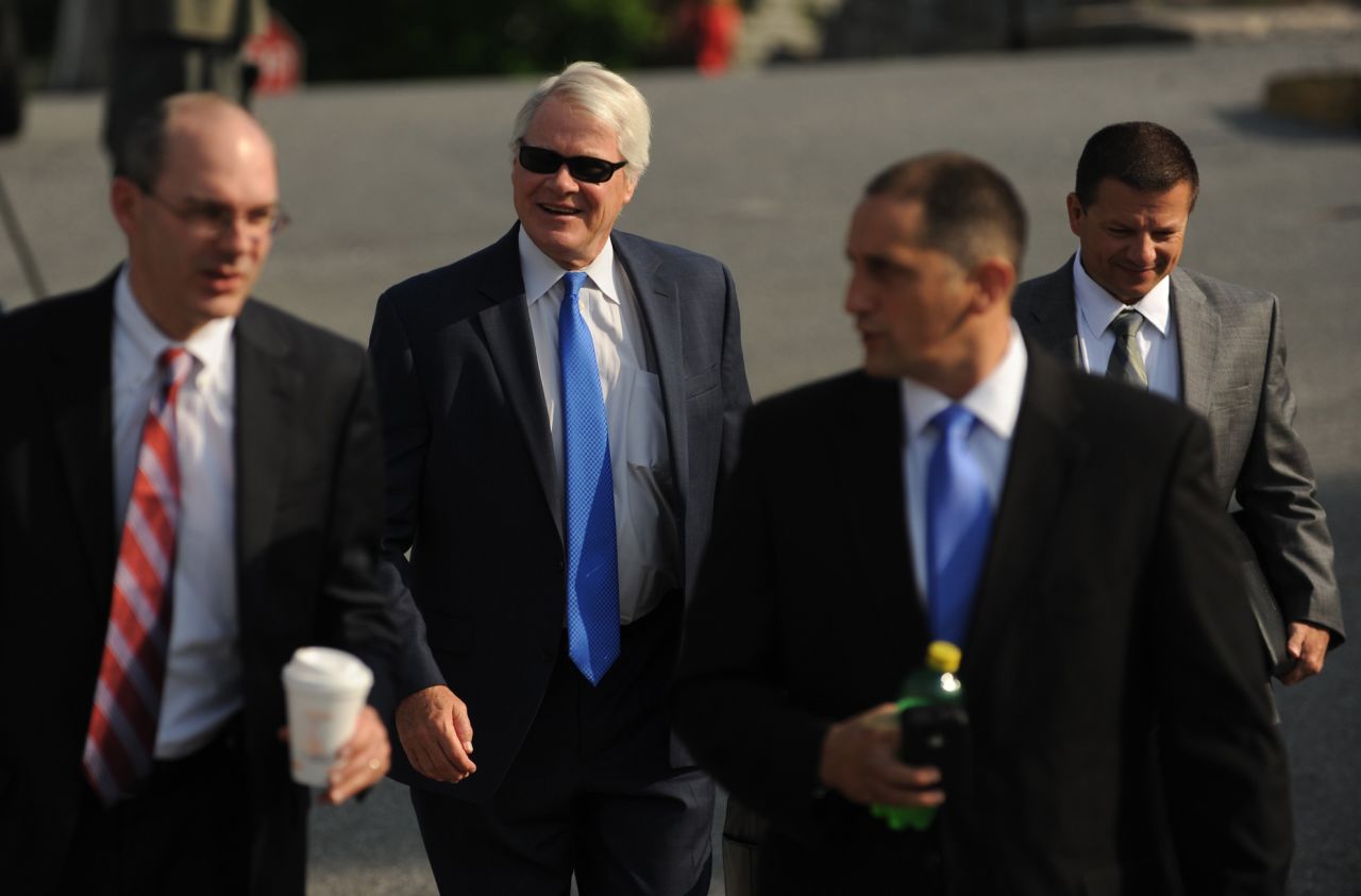 Prosecutor Joseph E. McGettigan III, second from left, and the rest of his prosecution team arrive at the courthouse Friday.