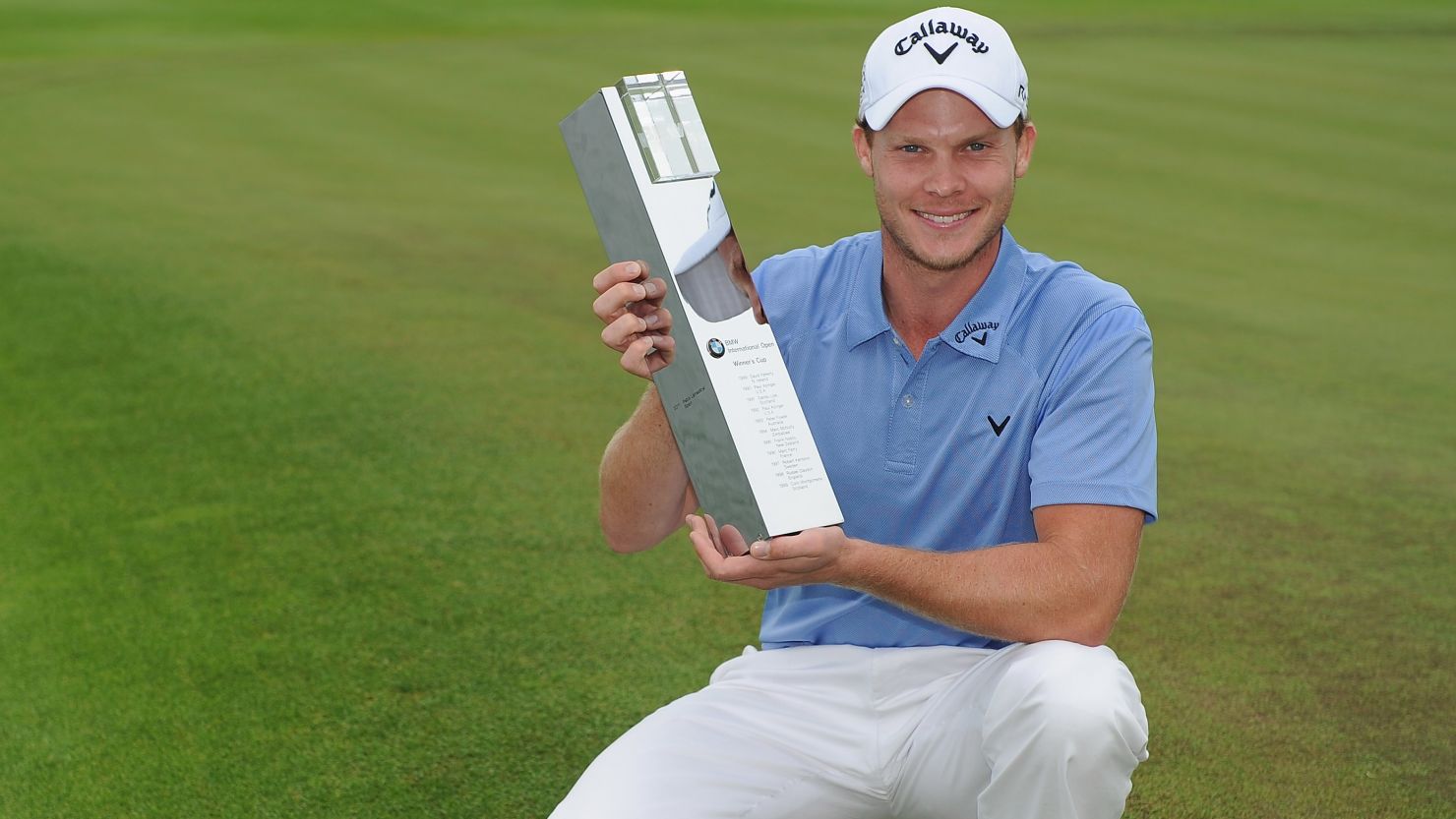 Danny Willett with the winning trophy from the BMW International Open in Cologne.