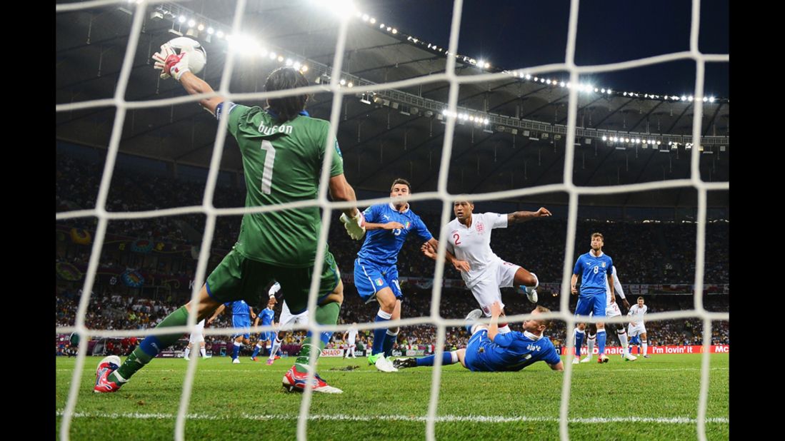 Italy's Gianluigi Buffon makes a save during Sunday's quarterfinal match against England.