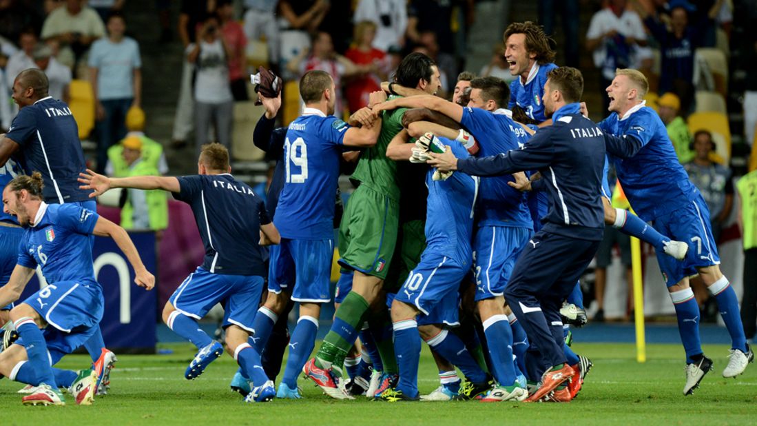 Italy's national team celebrates after winning the penalty shootout in the quarterfinal match against England on Sunday, June 24, in Kiev, Ukraine. 