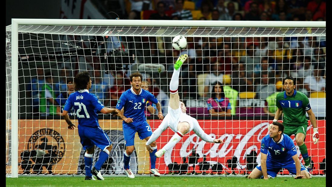 Wayne Rooney of England attempts an overhead kick on Sunday against Italy. 