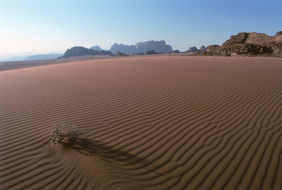 Wadi Rum is a vast area of protected desert in southern Jordan. Its red sands stretch like seas between mountains of sandstone. 