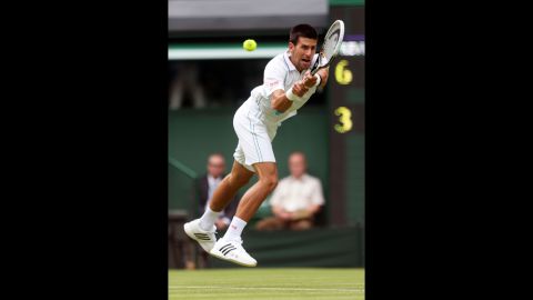 Serbia's Novak Djokovic fires a backhand return against Juan Carlos Ferrero of Spain on June 25.