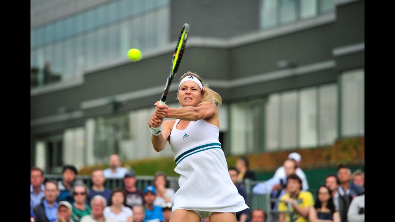 Russia's Maria Kirilenko plays a double-handed backhand shot during her first round women's singles match against Romania's Alexandra Cadantu. Kirilenko won the match.