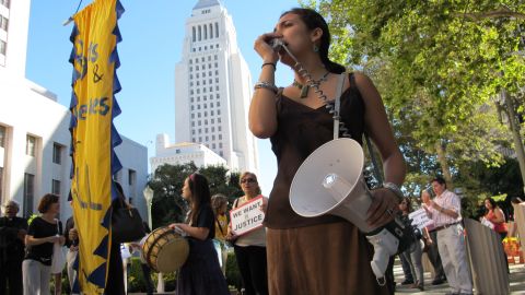 Members of the Coalition for Humane Immigrant Rights of Los Angeles hold a rally and vigil on June 25.