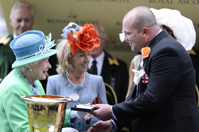 Trainer Peter Moody also met the British monarch following the horse's dramatic triumph.