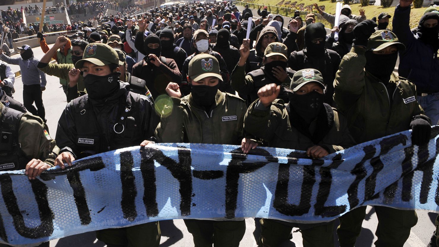 Police officers on strike march along the streets of La Paz, Bolivia, on June 25, 2012. 