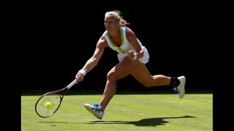 Dutch player Kiki Bertens returns during her ladies' singles first-round match against the Czech Lucie Safarova on June 26.
