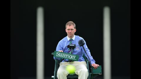 Court 5 umpire sitting in his chair on the second day of the 2012 Wimbledon Championships tennis tournament June 26.
