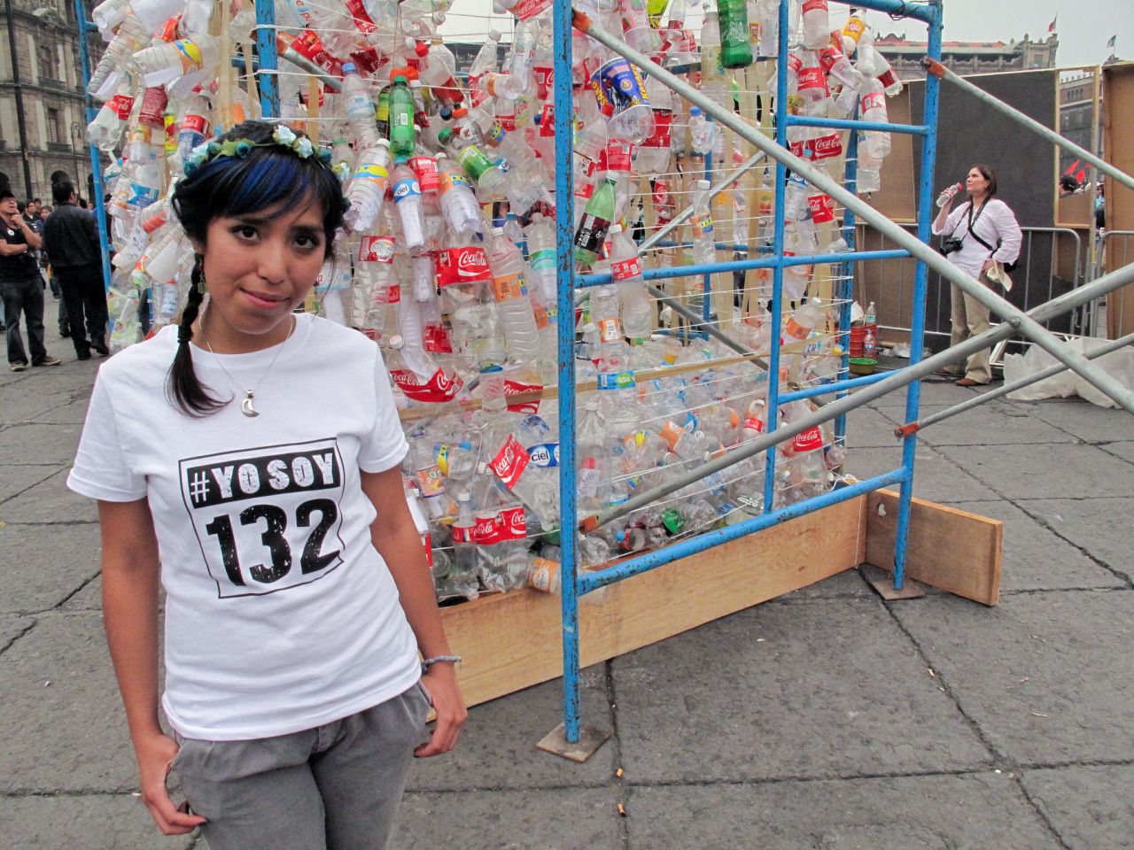 Selene Galindo Enriquez, 20, stands beside an art installation that she and other youth protesters helped create in Mexico City. 