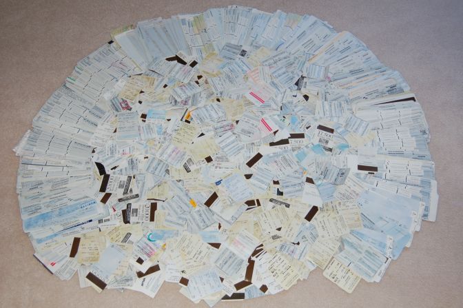 The family has amassed an impressive collection of airline ticket receipts during their travels.