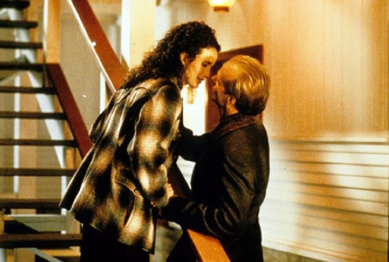 In "Michael," John Travolta plays an atypical angel whose mission is to bring cynical reporter Frank (William Hurt) and Dorothy (Andie MacDowell) together.