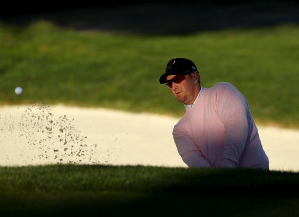 The 40-year-old plays with trademark dark glasses due to his eyes' sensitivity to light.