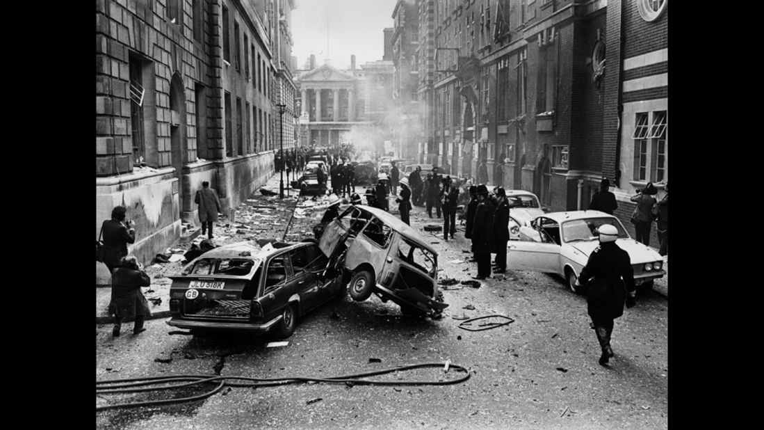 Damage caused by an IRA bombing on March 8, 1973, litters a street in London. That year, the IRA resolved to expand its attacks to create more violence in mainland Britain.