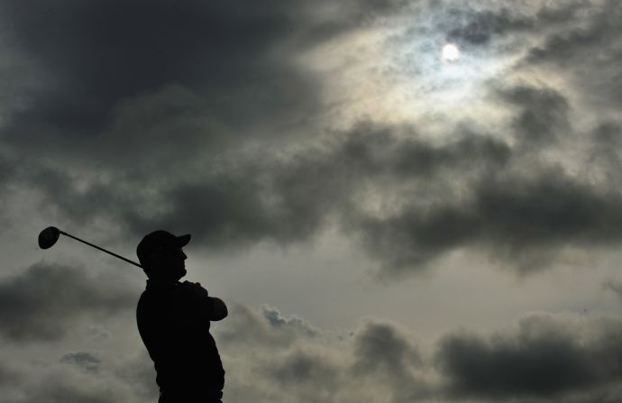 He says it is easier to wear them, no matter the conditions -- such as here at the 138th British Open at Turnberry in 2009. 