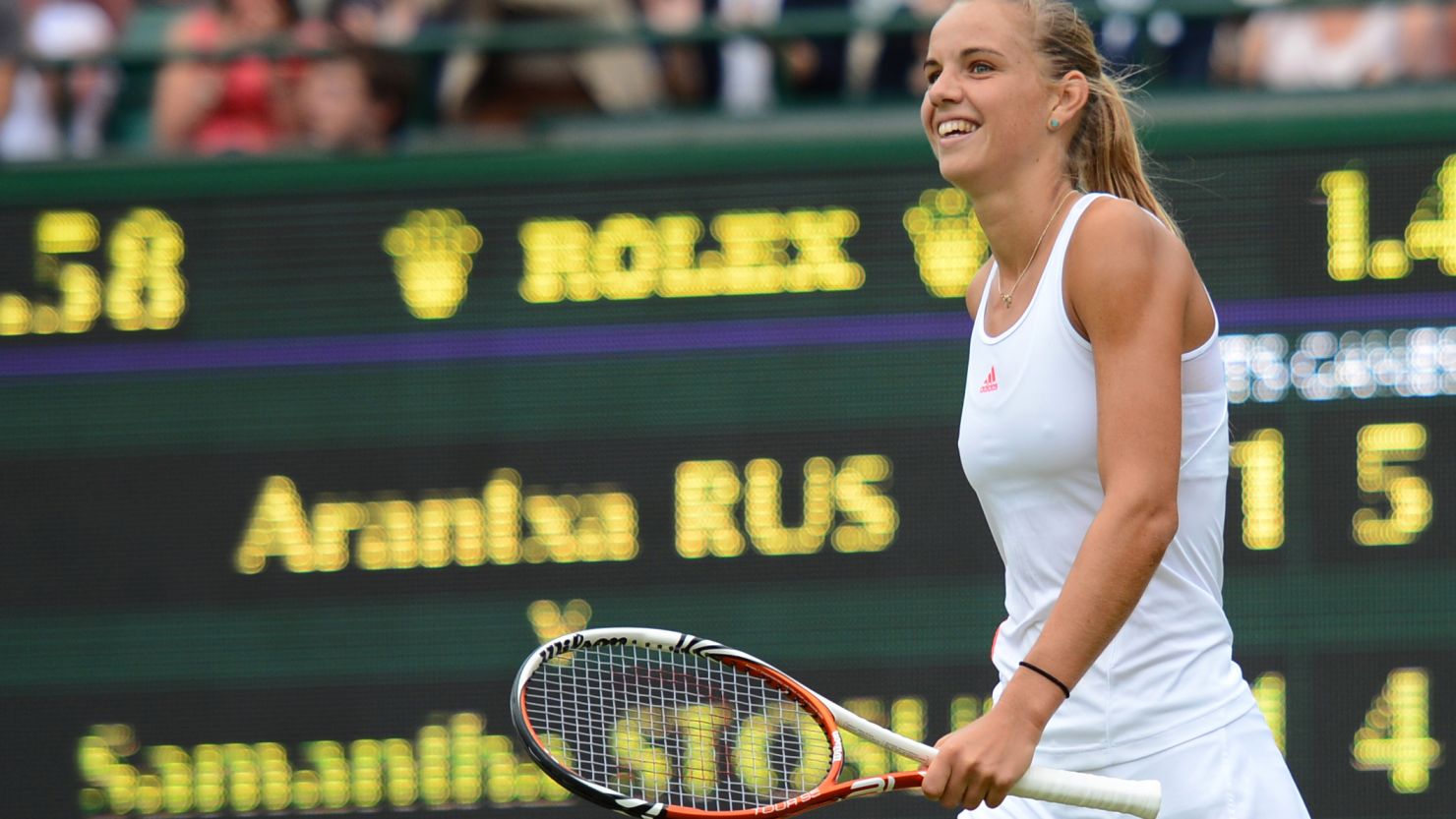 Arantxa Rus celebrates her second-round victory over Australia's Samantha Stosur on day three at Wimbledon.