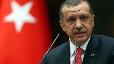 Prime Minister Recep Tayyip Erdogan says Turkey will treat a military approach toward its borders by Syria as a potential threat.
