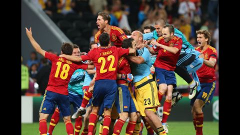The Spanish national team celebrates its win in the Euro 2012 semifinal match against Portugal at Donbass Arena in Donetsk, Ukraine, on Wednesday, June 27. 