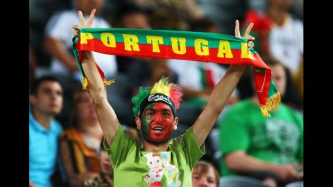 A Portugal fan shows his support.