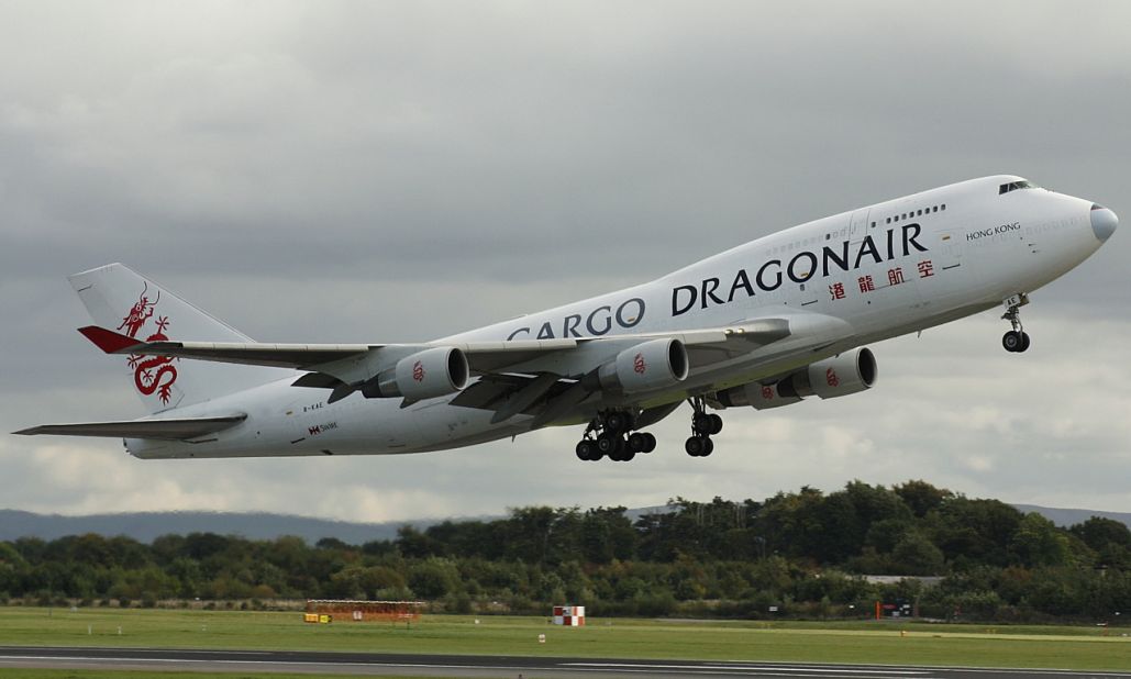 Plane spotters rave about the great photo shooting locations surrounding England's Manchester Airport. Krzysztof Tomczak, a spotter based in Poznań, Poland, captured this image of a Dragonair Cargo Boeing 747-412.